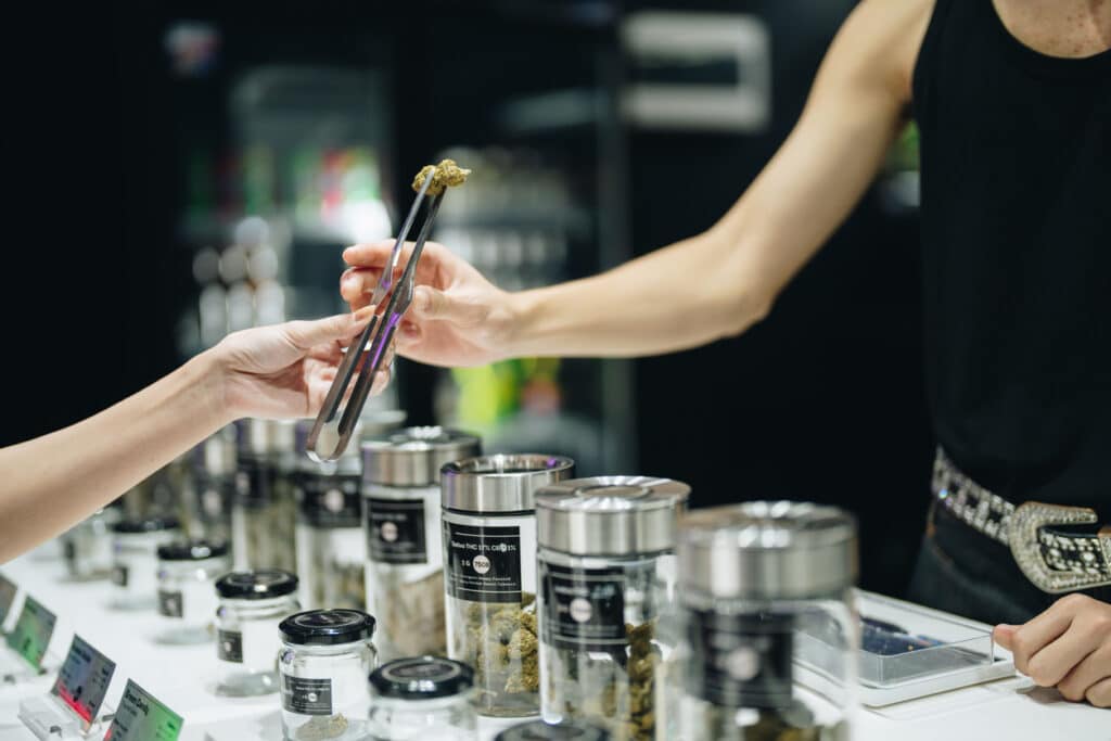 The process of choosing and buying cannabis.